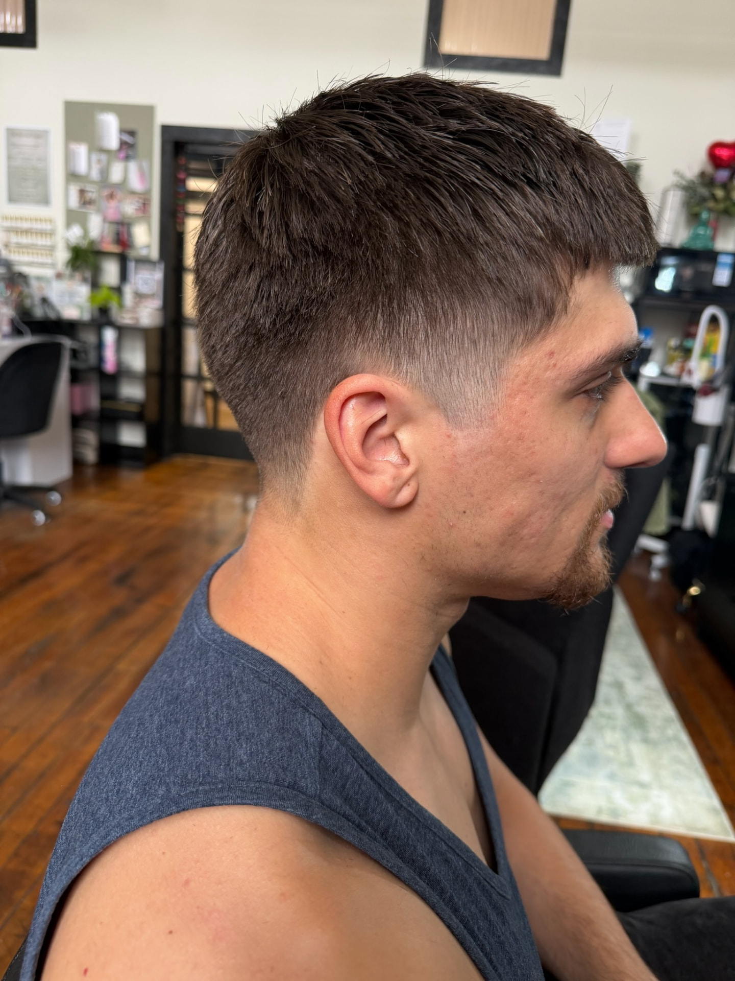 Men's textured taper cut styled in the studio