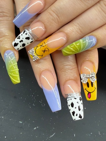 Colorful square-tip nails with lime, lavender, orange and character art