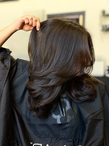 Dark layered blowout photographed from behind