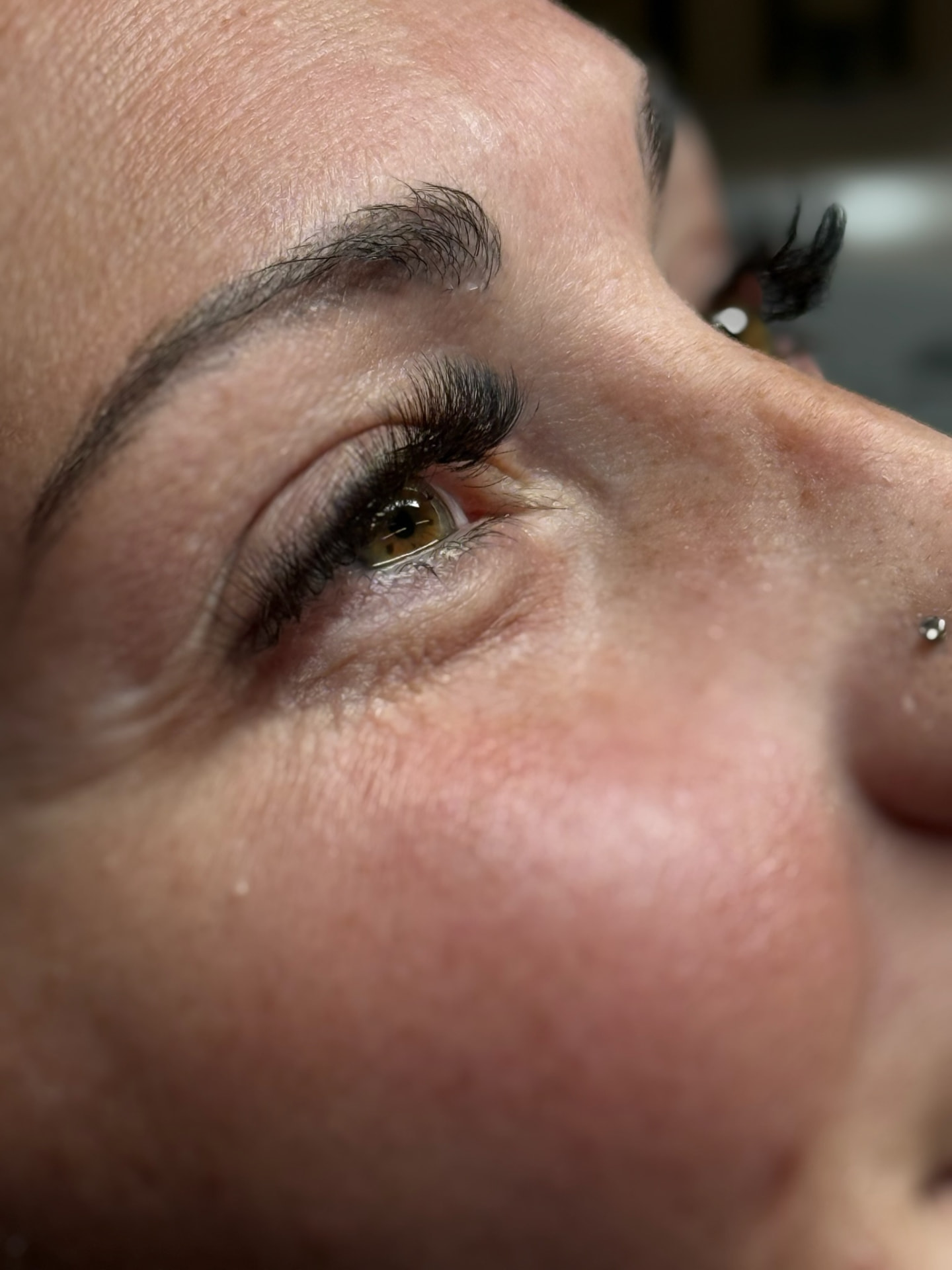 Side view of dramatic eyelash extension work