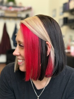 Short dark bob with vivid red and blonde color blocking