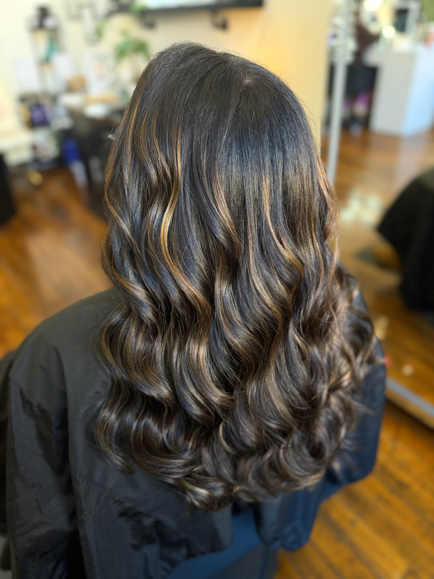 Dark brown waves with subtle caramel dimension