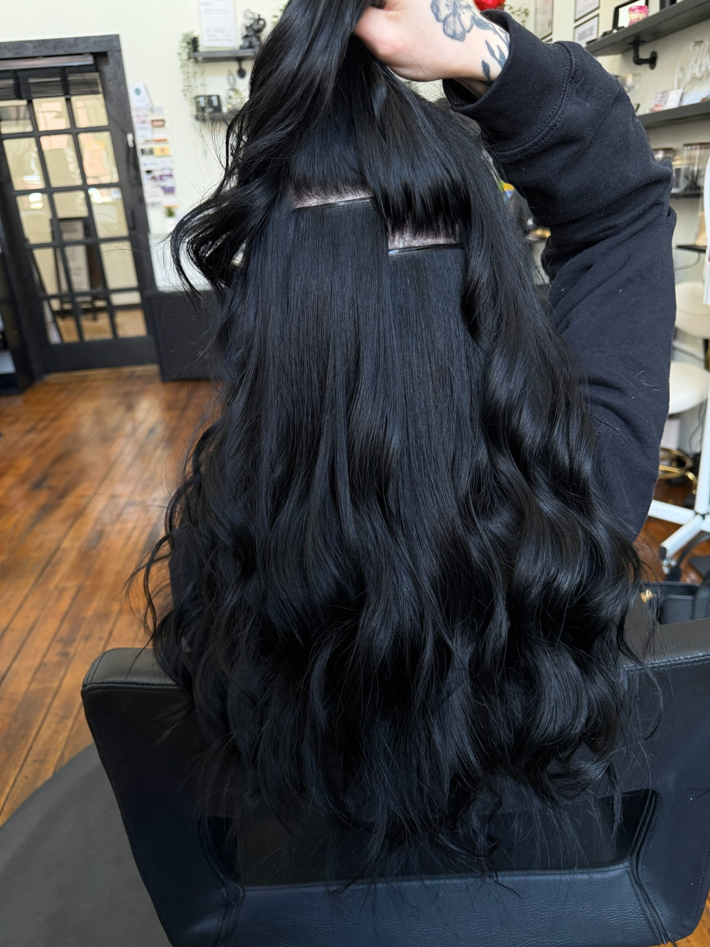 Long glossy black hair extension result