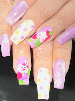 Pastel pink and lavender acrylic nails with bunny and floral art